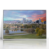 Art deco style Denver skyline in muted gray and blue tones on white framed acrylic, ideal for modern nursery wall decor.