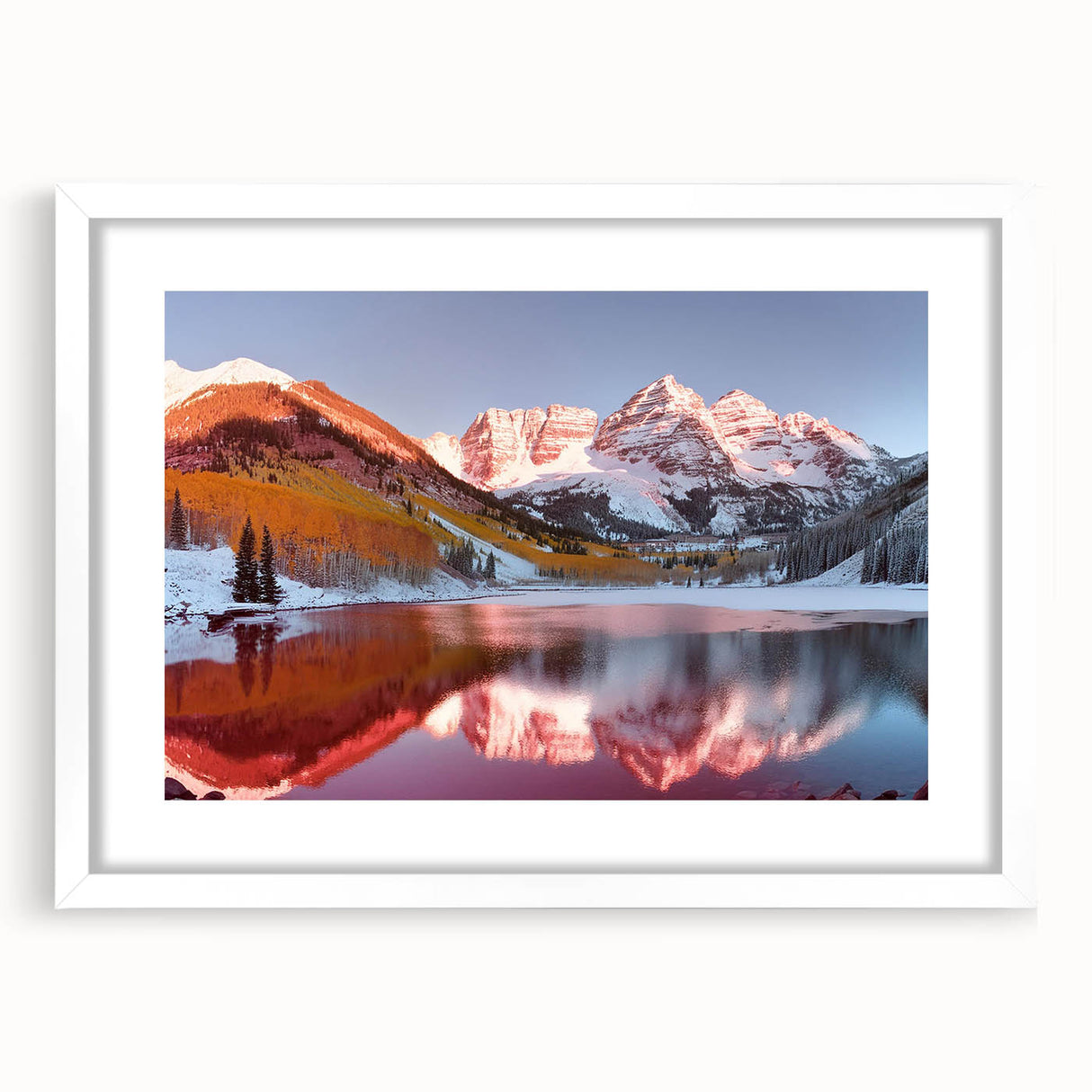 Abstract art print of Maroon Bells in Colorado with muted earth tones, framed with a white mat.