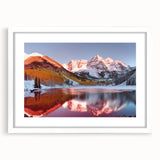 Abstract art print of Maroon Bells in Colorado with muted earth tones, framed with a white mat.