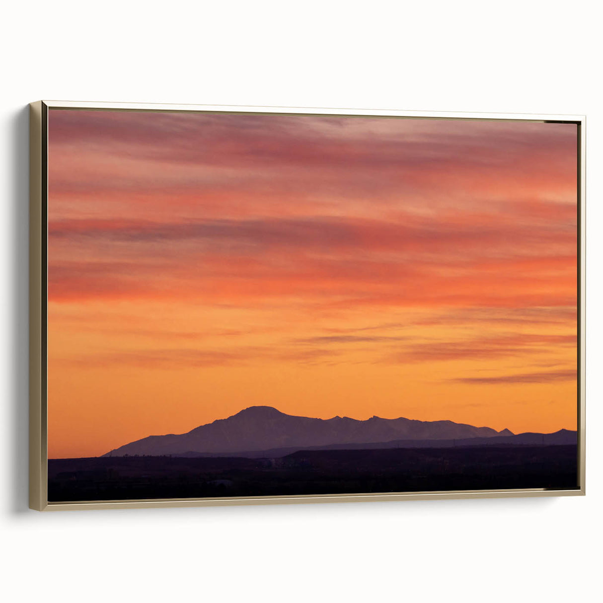 Framed canvas of Pikes Peak landscape in muted gold and black tones, ideal for bedroom wall art.