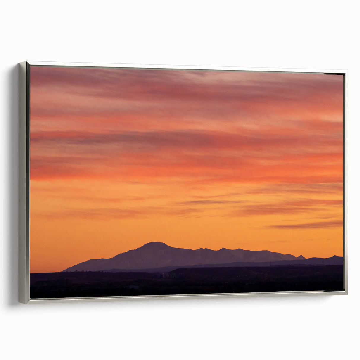 Landscape art painting of Pikes Peak in Colorado, featuring colorful art on a black vintage poster styled framed canvas.