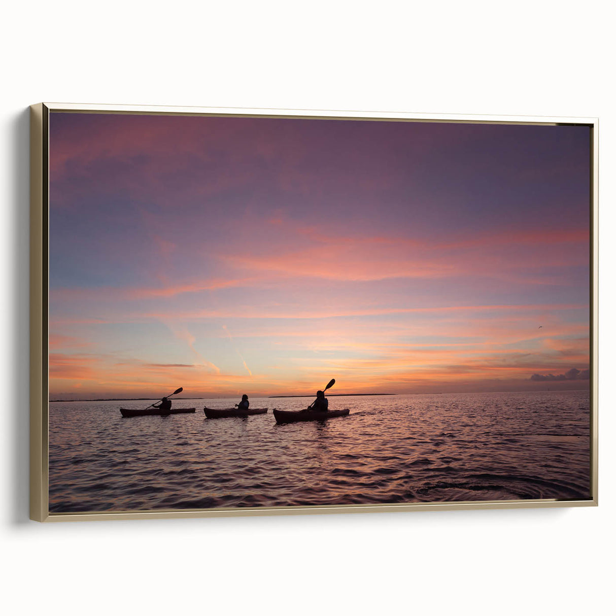 Framed canvas featuring a vintage-style landscape painting of the Florida Keys with muted gold and black tones.