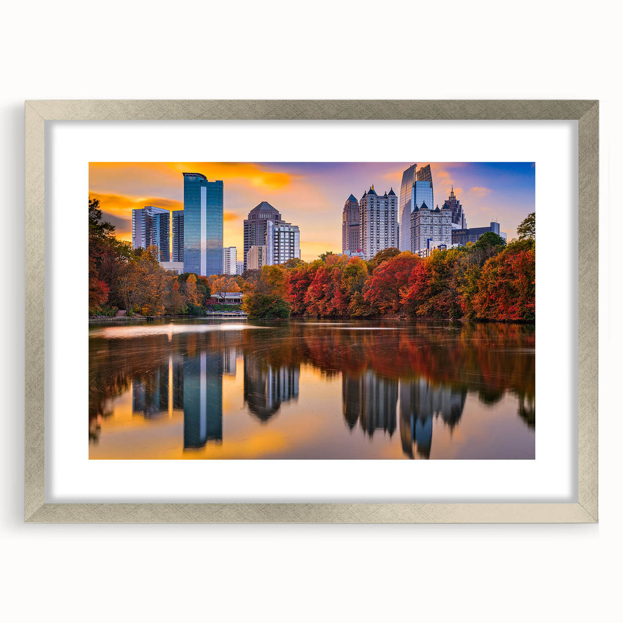 Textured abstract art print of Atlanta skyline in muted gray and blue tones on a framed silver canvas.