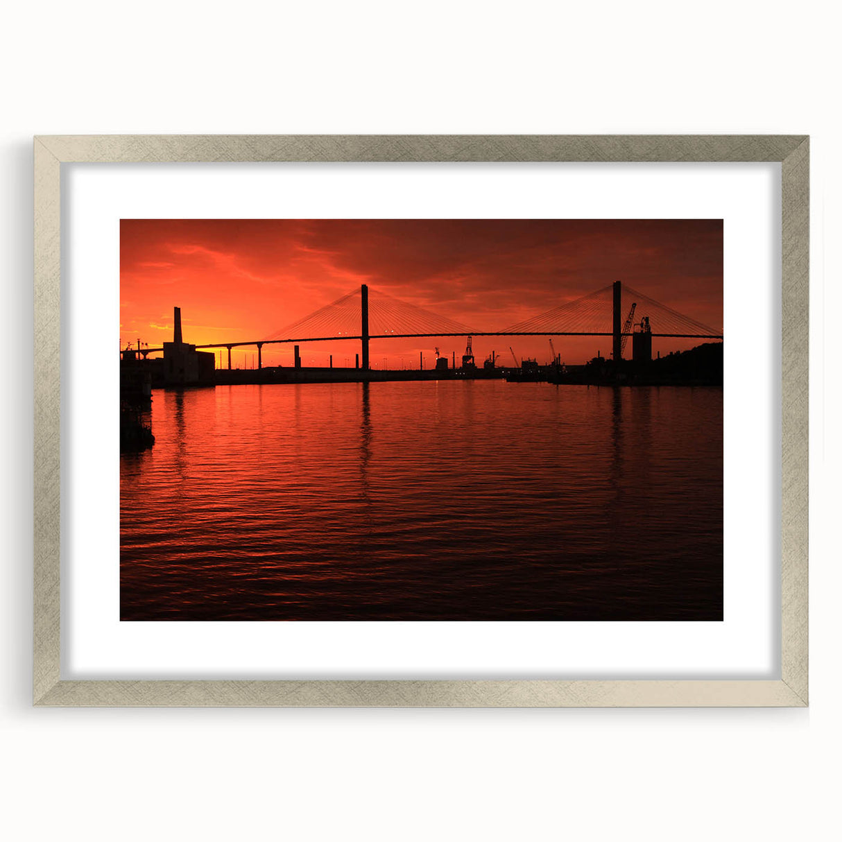 Textured art print of Savannah with abstract designs and muted earth tones on a silver-framed mat.