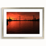 Textured art print of Savannah with abstract designs and muted earth tones on a silver-framed mat.