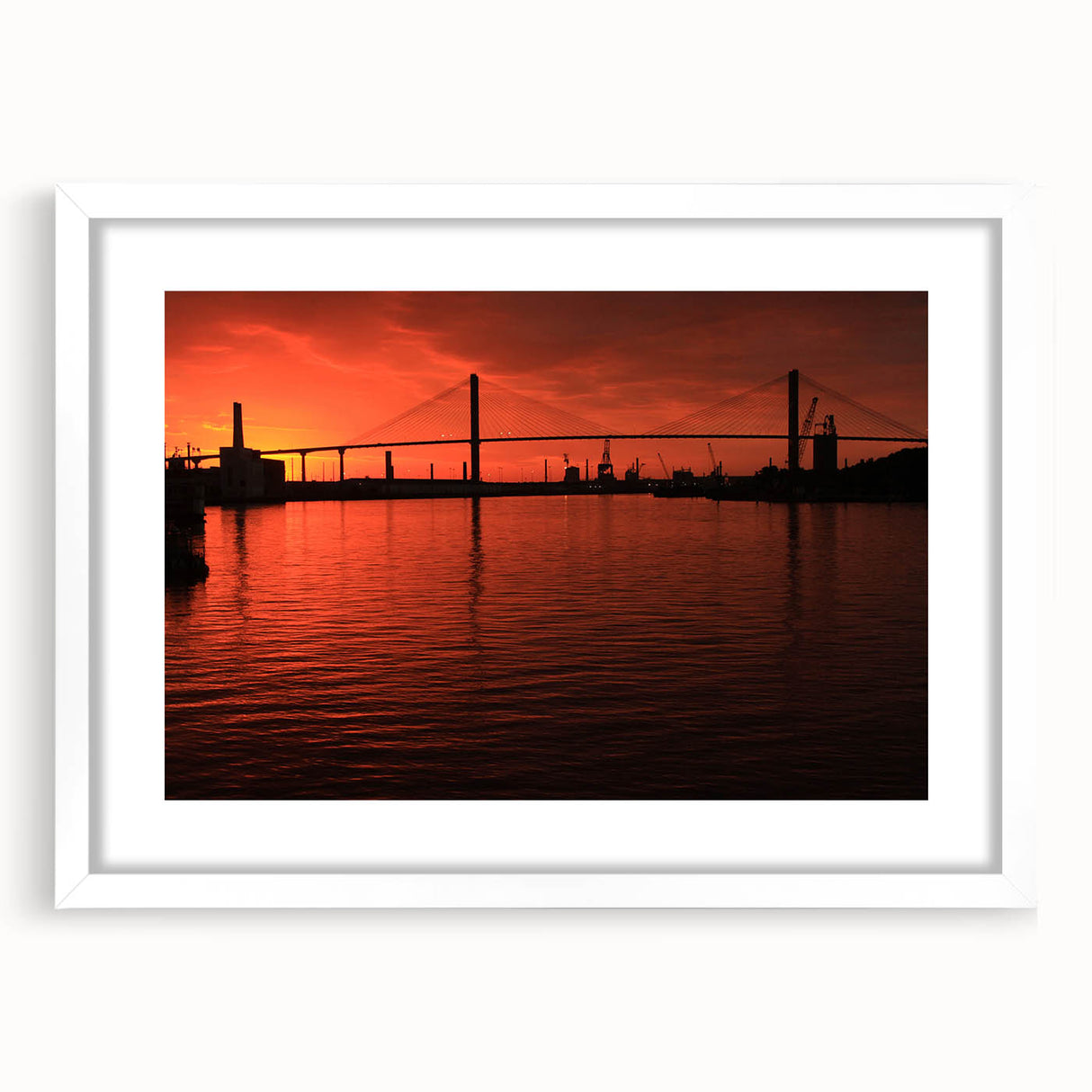 Abstract art print depicting Savannah scenery in muted earth tones on a white framed mat, suitable for dining room decor.