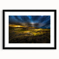 Abstract art print featuring textured, colorful swirls on a large canvas, framed in black, ideal for living room decor.