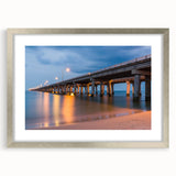 Textured art of abstract Chesapeake Bay in muted blue and gray tones on a framed silver mat, suitable for bedroom decor.