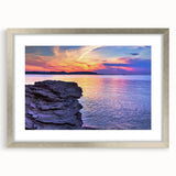 Mid-century modernist art depicting Michigan's Upper Peninsula in muted earth tones on a framed silver mat.