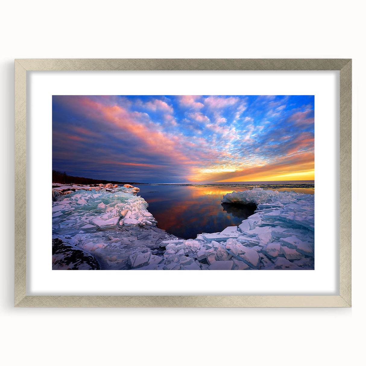 Textured abstract art print of Minnesota scenery in muted earth tones, framed with a silver mat, suitable for bedroom decor.