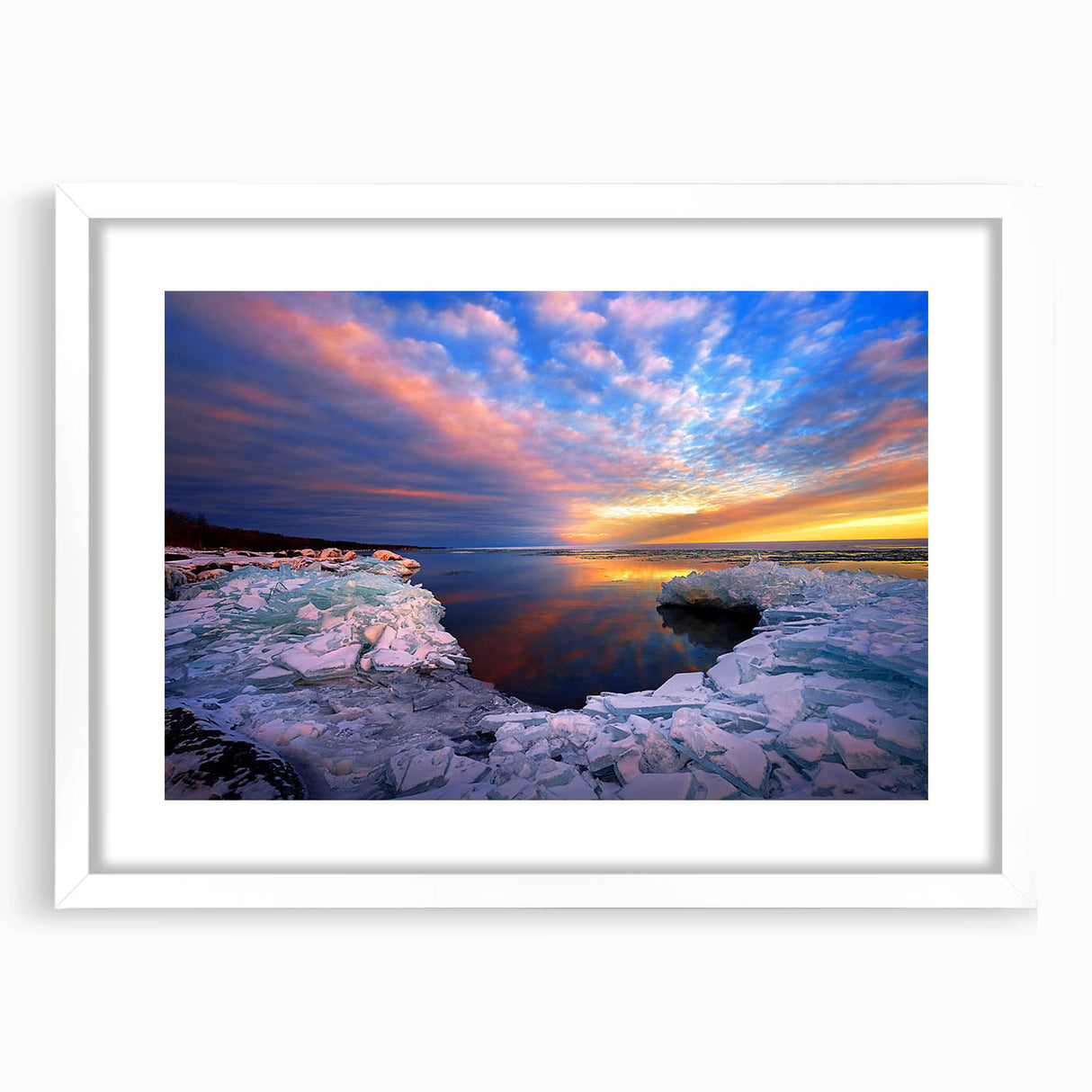 Abstract art print of a Minnesota landscape in muted green and blue tones on a white framed poster.