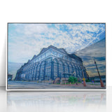Art deco poster of St. Louis skyline in muted blues and grays on framed acrylic, suitable for modern nursery wall art.