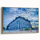 Framed canvas of St. Louis skyline in gold and black, ideal for adding a vintage touch to office spaces.