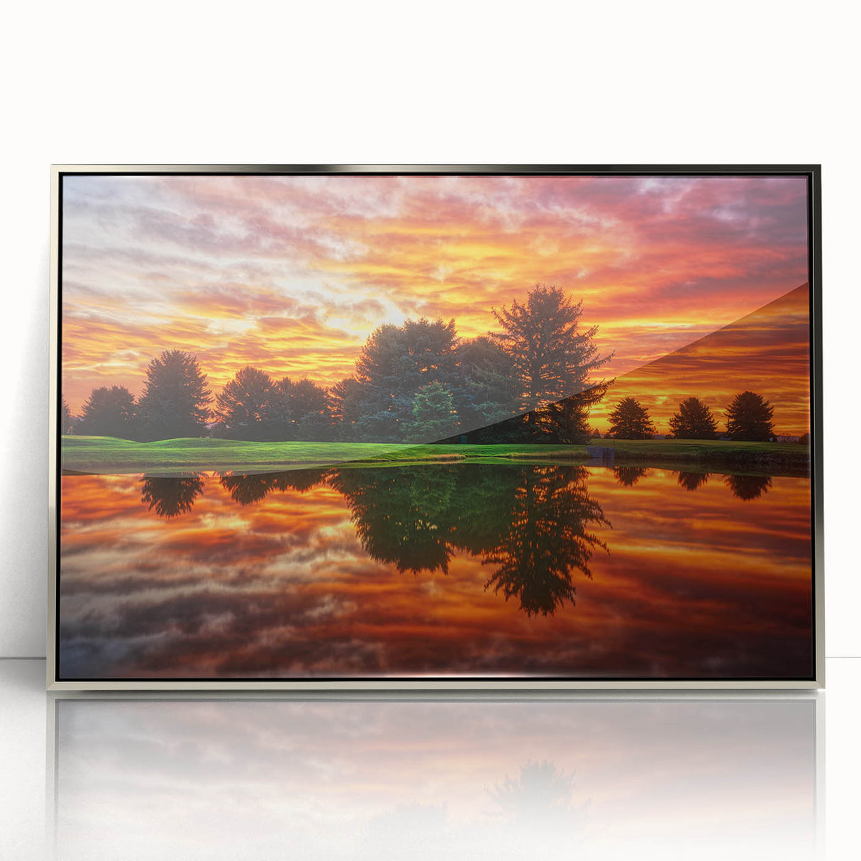 Mid-century modernist art depicting Nebraska scenery in muted earth tones on a silver-framed acrylic print.