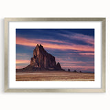 Textured art print of abstract White Sands, New Mexico scenery in muted earth tones, framed in silver, ideal for bedroom art.