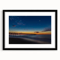 Extra large abstract art print of Cape Hatteras with vibrant, colorful textures on a framed black mat canvas.