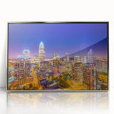 Mid-century modernist art depicting the Charlotte, North Carolina skyline in soft gray and blue tones.