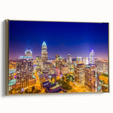 Framed canvas featuring a vintage-style landscape painting of Charlotte, North Carolina in black and gold tones.