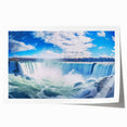 Extra large wall art featuring the Niagara Falls in vibrant blue and white tones on a rolled canvas.