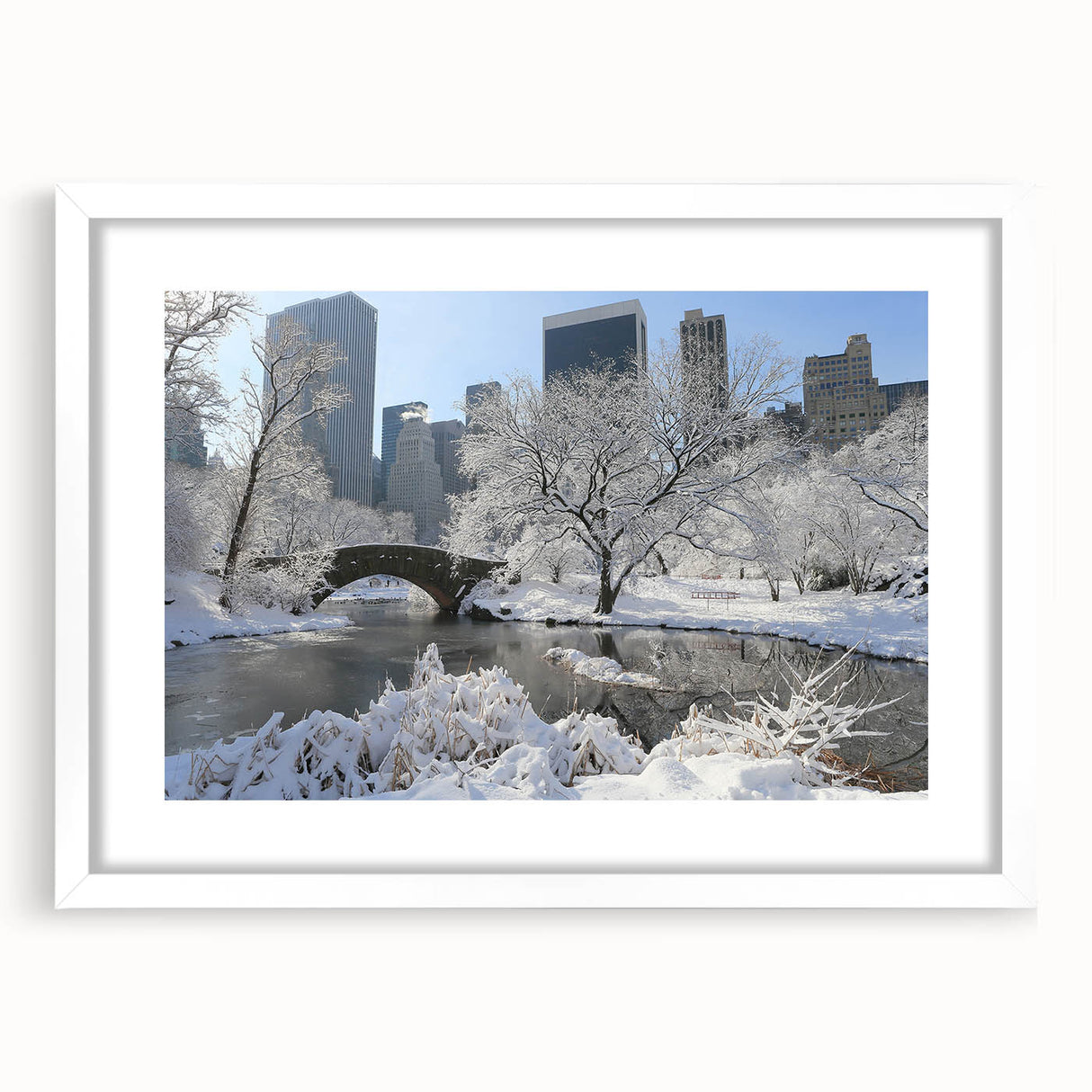 Abstract art print of Central Park in muted green and brown tones, framed in white, ideal for bedroom or dining room decor.
