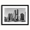 Abstract art print of the Chrysler Building in colorful, textured hues on a large black-framed canvas.