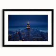 Abstract art print of NYC's Empire State Building in colorful, textured strokes on a large framed canvas.