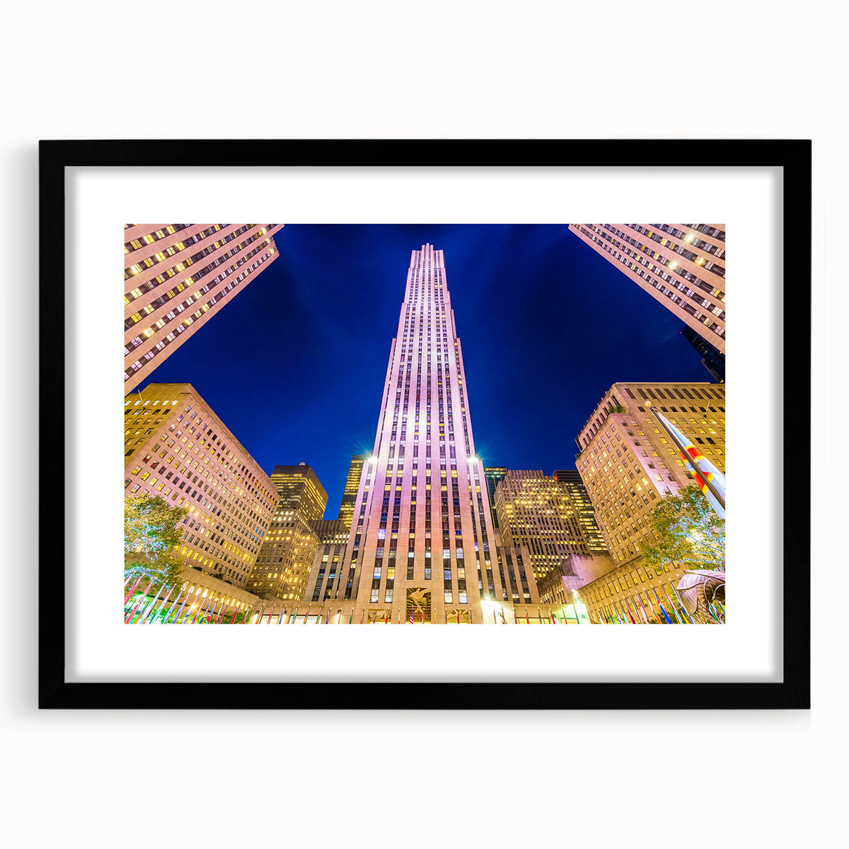 Abstract art print of NYC Rockefeller scenery in vibrant colors on a large textured canvas, ideal for living room decor.