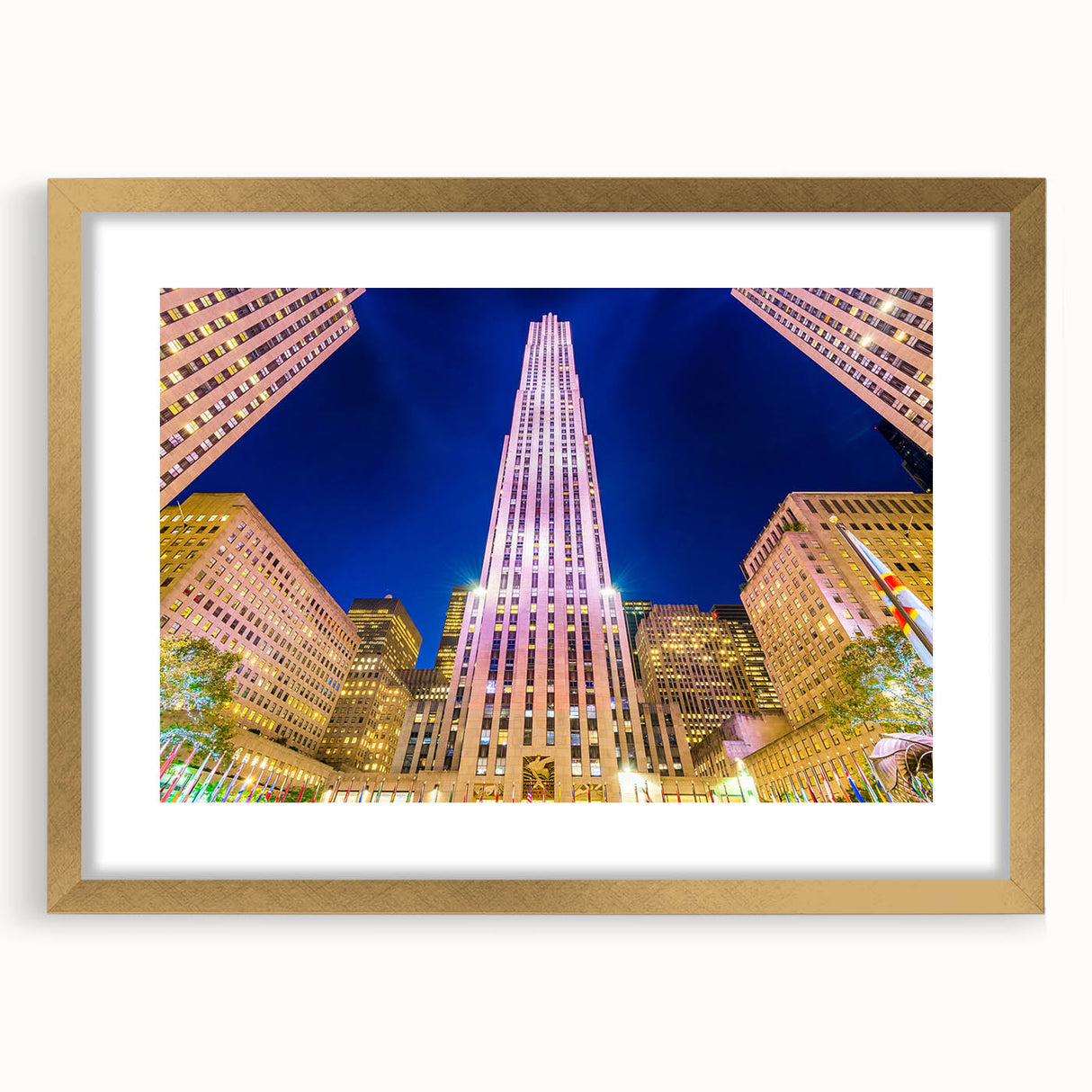 Extra large abstract art print of NYC Rockefeller scene in muted grays and blues, framed in gold.