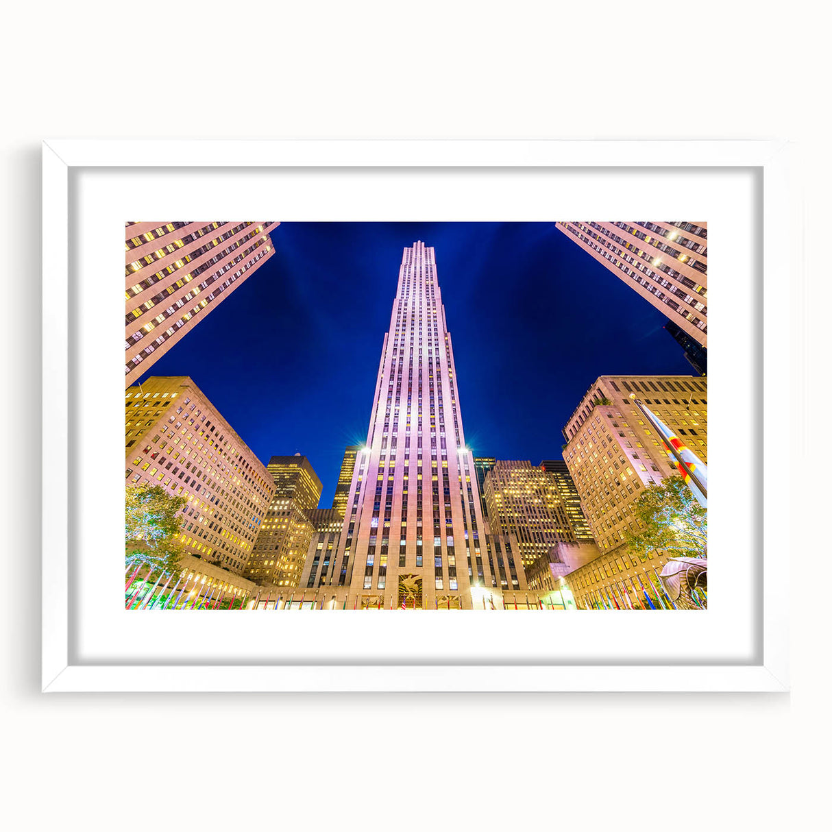 Abstract art print of NYC Rockefeller skyline in muted gray and blue tones on a white framed mat.