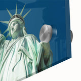 Acrylic print of the Statue of Liberty in muted green and blue hues.