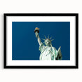 Abstract depiction of the Statue of Liberty in vibrant, colorful tones on a large, textured canvas.