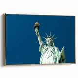 Framed canvas featuring a side view of the Statue of Liberty in black and gold tones, ideal for bedroom wall art.