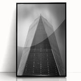 Large abstract wall art depicting the NYC skyline in muted gray and blue tones on a framed acrylic panel.