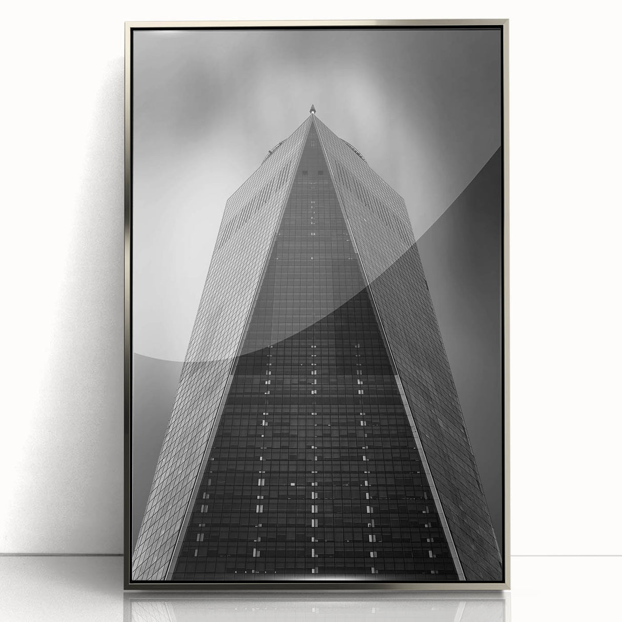 Mid-century modernist art depicting New York City skyline in muted gray tones on a framed acrylic print.