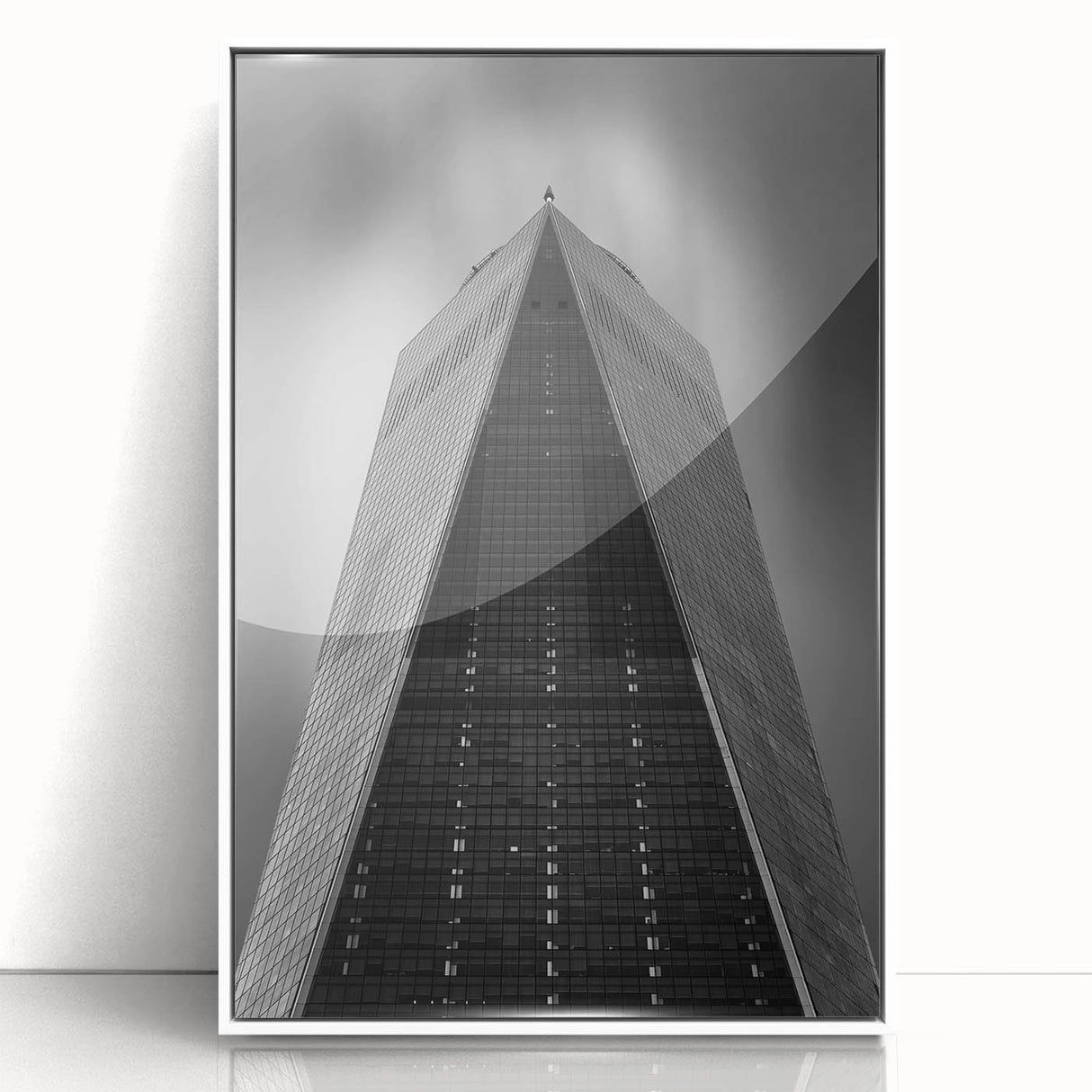 Acrylic print of the NYC skyline featuring the Trade Center, executed in art deco style with a white frame.