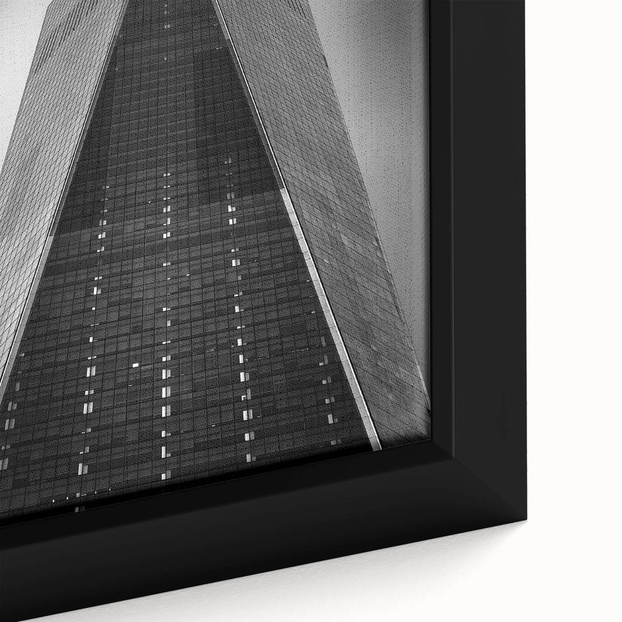 Extra large framed canvas featuring a textured depiction of the NYC skyline in black with colorful accents.