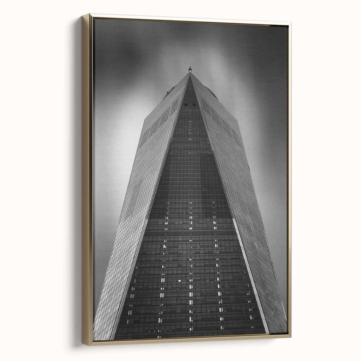 Framed canvas of New York City skyline in black and gold tones, ideal for bedroom wall art.