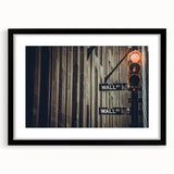 Abstract art print of NYC's Wall Street in vibrant colors on a large, framed canvas, ideal for living room decor.