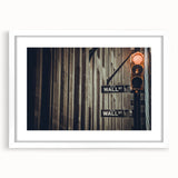 Abstract art print of Wall Street in muted gray and blue tones on a framed white mat, ideal for dining room decor.