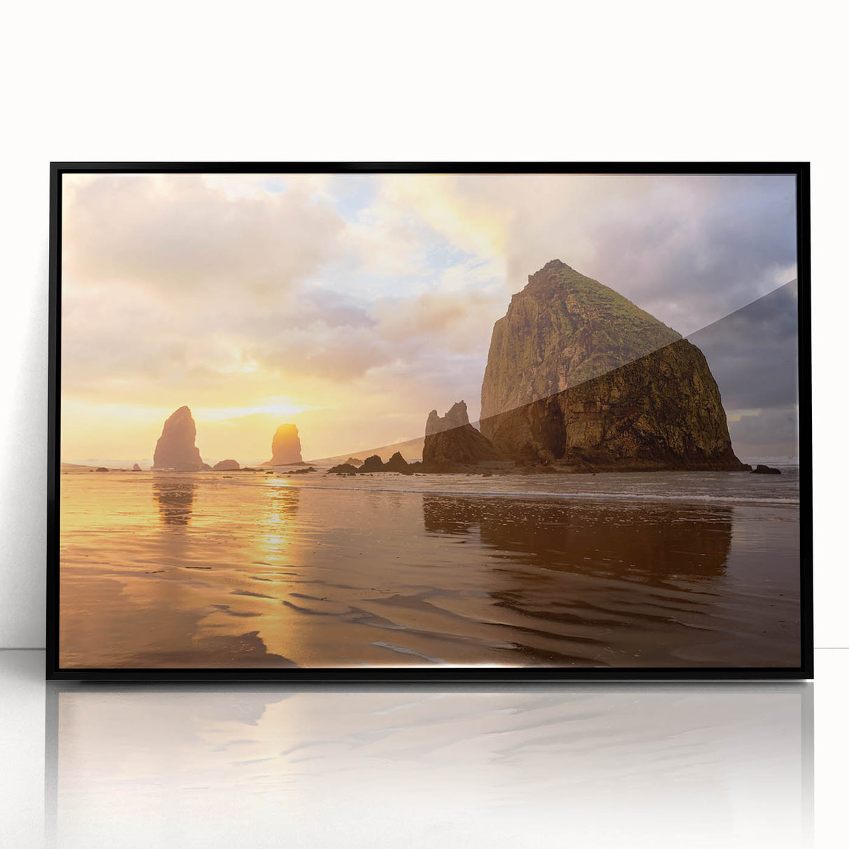 Large abstract wall art of Cannon Beach, Oregon in muted gray tones on a framed acrylic print.
