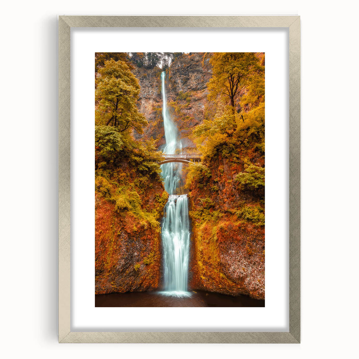 Textured art print of Multnomah Falls, Oregon, featuring muted green and blue tones on a framed silver mat.