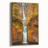 Framed canvas of Multnomah Falls in vintage poster style, with muted green and black tones, ideal for bedroom wall art.