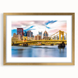 Abstract art print of Pittsburgh skyline in textured gold frame, ideal for extra large wall art in a living room.