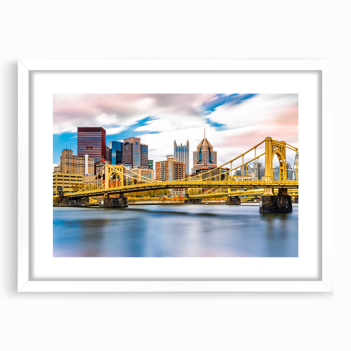 Abstract art print of Pittsburgh skyline in muted gray and blue tones on a framed white mat, suitable for dining room decor.