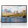 Large abstract wall art of Pittsburgh skyline in muted gray and blue tones on framed acrylic.