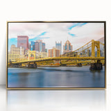 Framed acrylic print of Pittsburgh skyline in muted gold and gray tones, ideal for modern art wall decor.