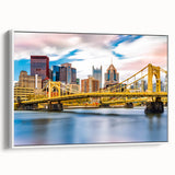Vintage poster art of Pittsburgh skyline in colorful hues on extra large framed canvas, ideal for living room wall.
