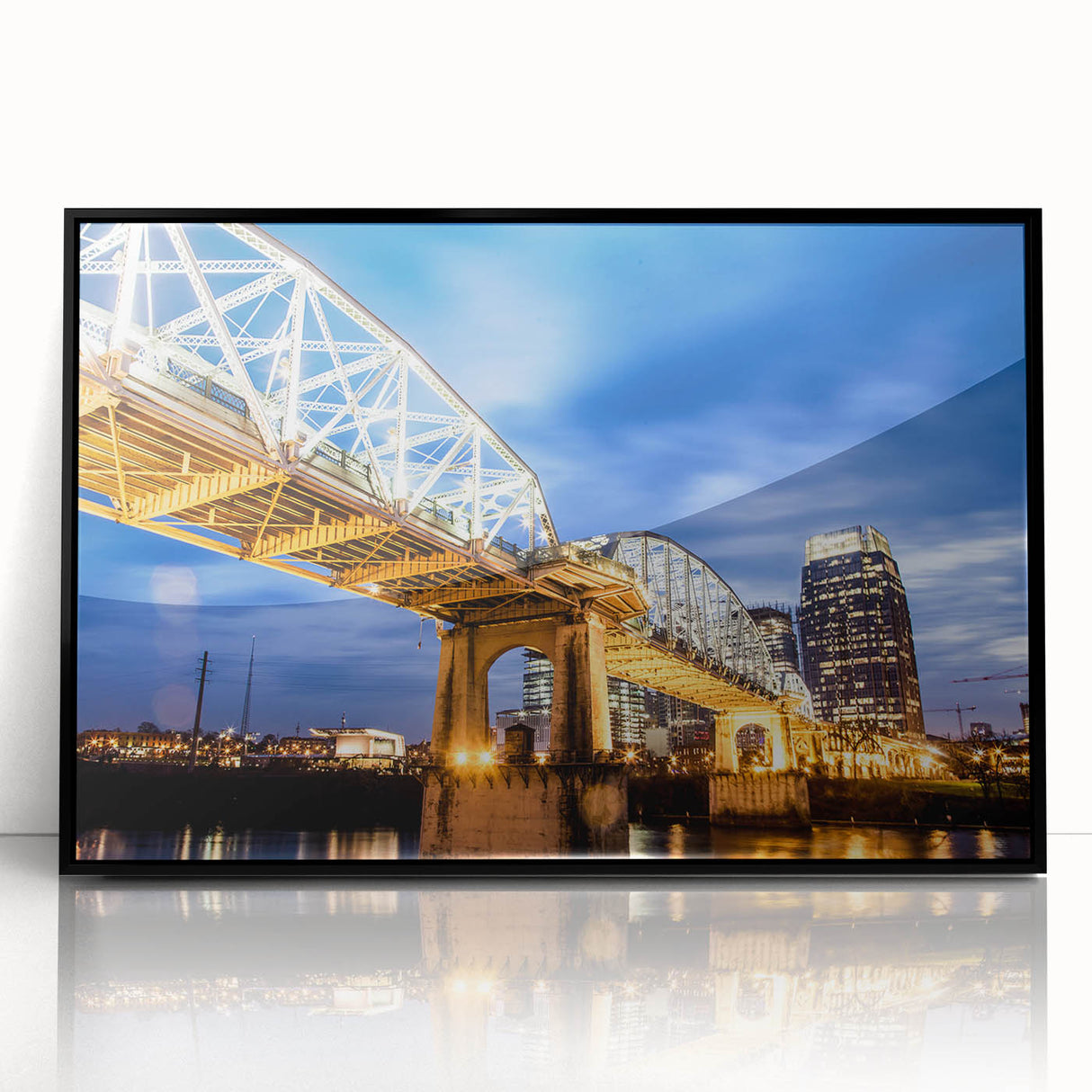 Large abstract wall art of Nashville skyline in muted gray and blue tones on a framed acrylic.