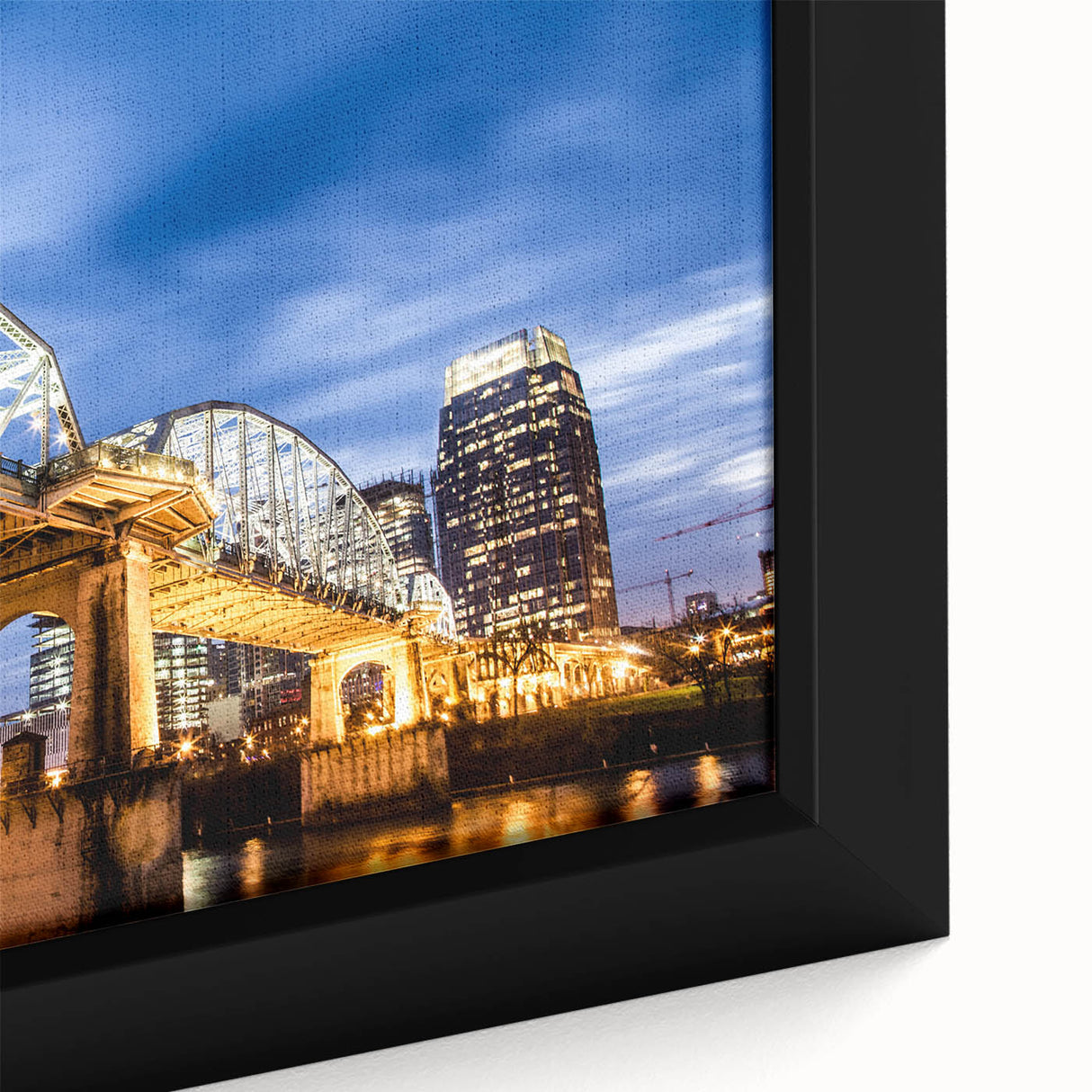 Framed canvas of Nashville skyline in black with colorful textured detailing, ideal for large living room walls.