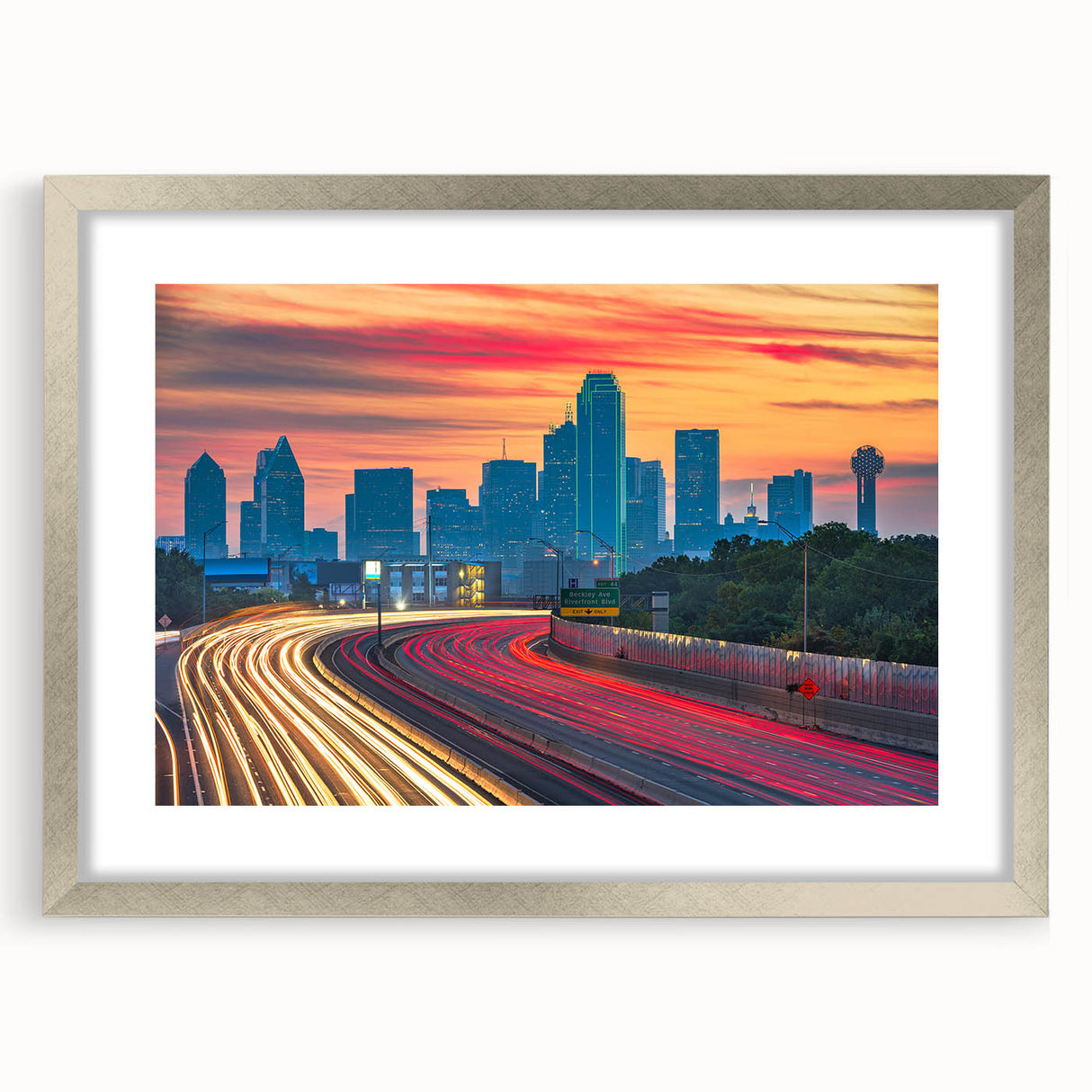 Textured art print of abstract Dallas skyline in muted blue and gray, framed in silver, ideal for bedroom art.